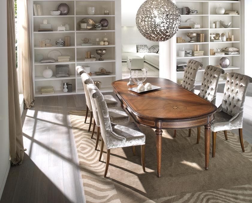 L'Arte dell'Accoglienza: Tavolo Ovale Intarsiato in Noce - Immagine 1