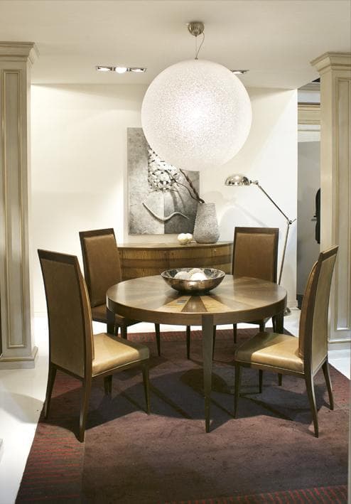 Design Conviviale: Tavolo Rotondo Noce e Frassino